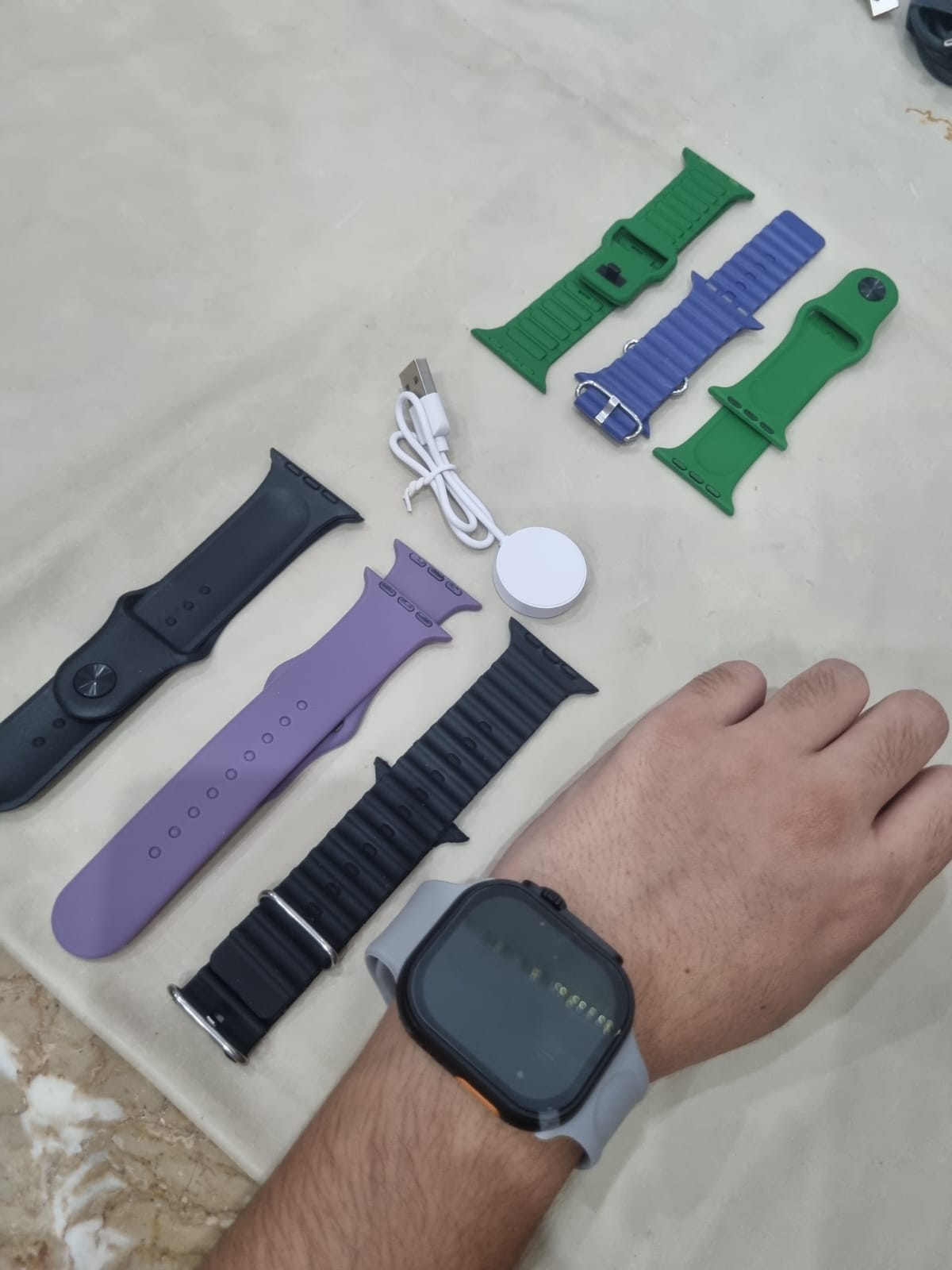 Z75 Smart Watch (7-in-1 Set)Premium ultra smartwatch featuring an HD display, fitness tracking, Bluetooth calling, and 7 interchangeable straps.